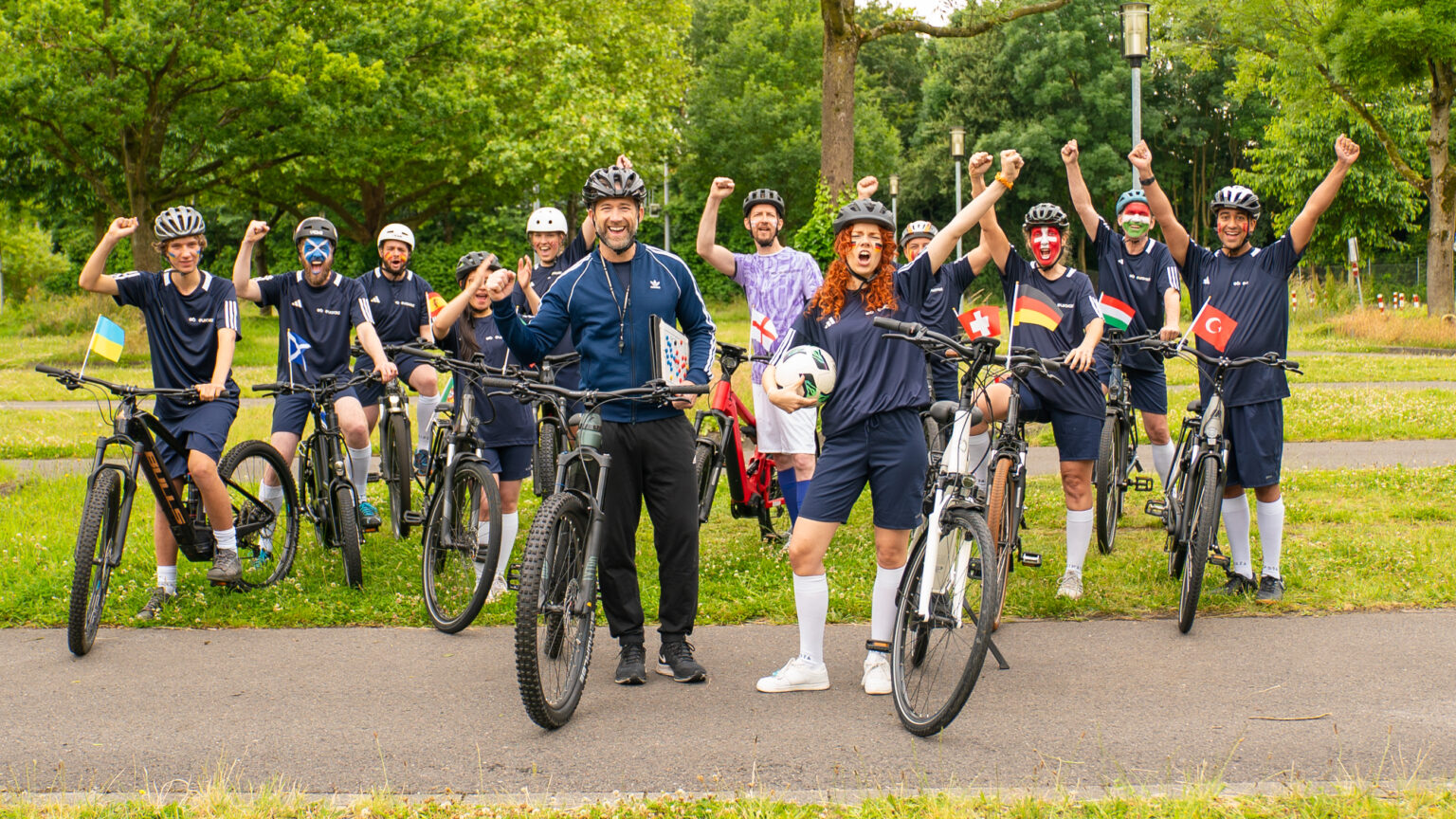A gathering of cyclists at a festival or other outdoor event.